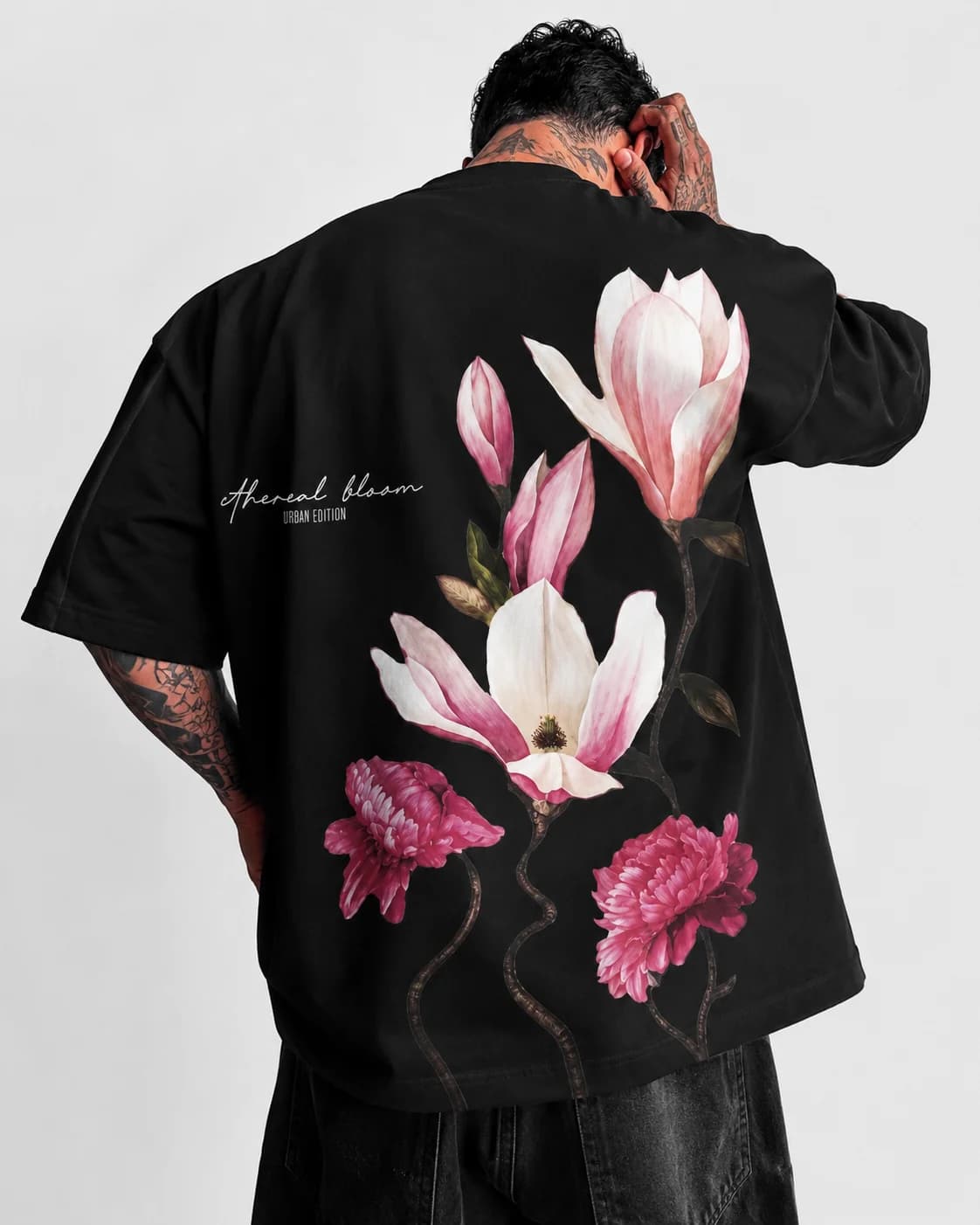 Ethereal Bloom Urban Edition t-shirt in black, photographic magnolia printed across the full back