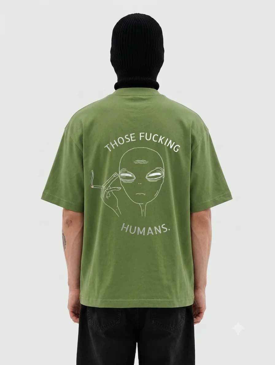 Those Humans t-shirt in army green, single-line alien illustration printed across the back with a caption above and below
